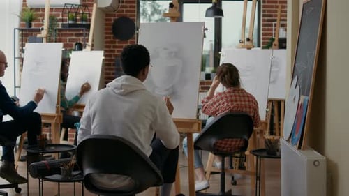 Art Class Working Diligently on Still Life Sketches