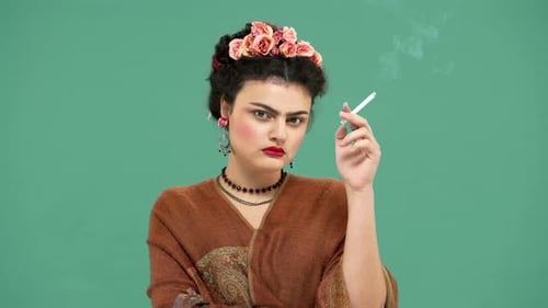 Woman in Frida Kahlo Style Holding Cigarette