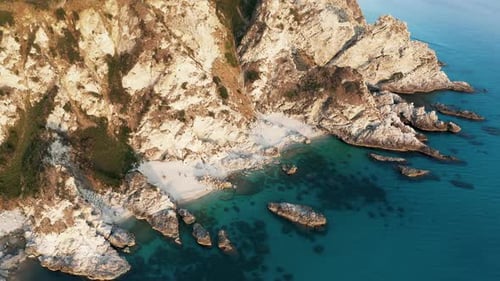 Rock Cliff on the Turquoise Sea