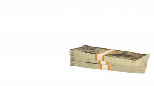 Muchos fajos de dinero cayendo sobre la mesa. Billetes de 10000 yenes japoneses.