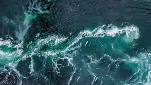 Waves of Water of the River and the Sea Meet Each Other During High Tide and Low Tide