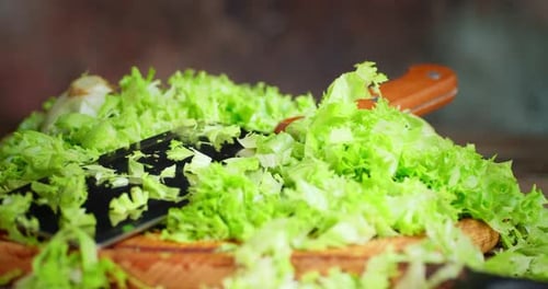 Freshly Chopped Lettuce on a Cutting Board