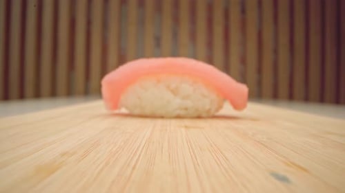 Zoom in Video of Nigiri Sushi Piece Fish on Rice Close Up