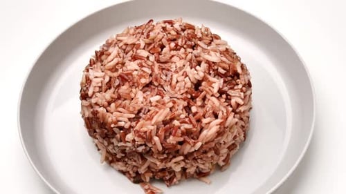 Cooked Mixed Rice in White Bowl Close Up