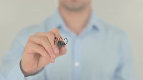 Man Writes Property Investment on Glass