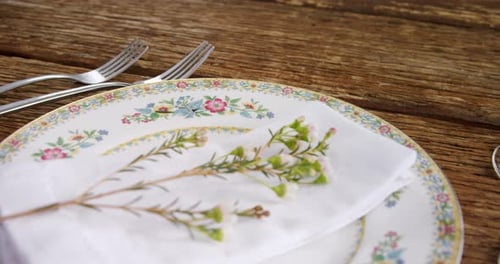 Elegant Place Setting with Floral China and Linen