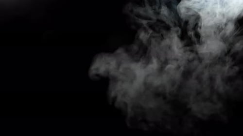 Abstract Smoke Flowing on a Black Background