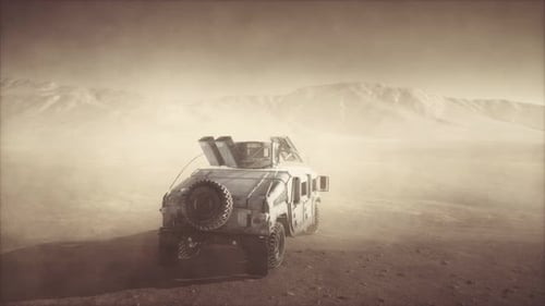 Military Patrol Car on Sunset in Desert Storm
