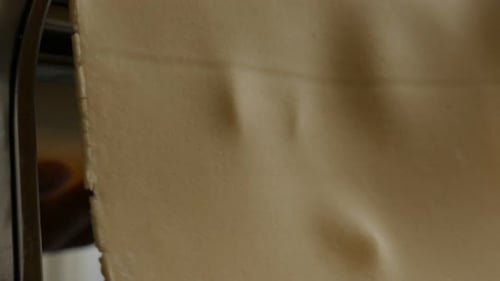 Lasagna made from dough close-up 4K 2160p 30fps UltraHD footage - Manual machine and Italian pasta