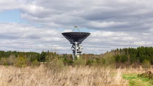 Large Radio Telescope Dish in a Rural Landscape