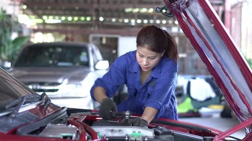 Woman repair engine car