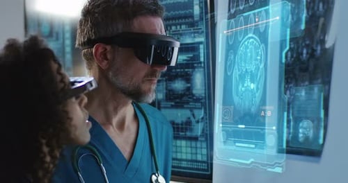 Doctors Analyzing Brain Scan with Virtual Reality Headsets
