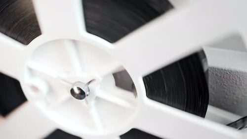 Film Reel Spinning in Close Up