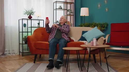 Adult Video Calling on Phone at Home