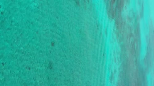 Tropical Island with Coconut Palm Trees and Turquoise Caribbean Sea with Floating Boats