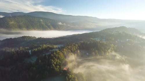 Breathtaking Drone Shot of Foggy Rural Landscape