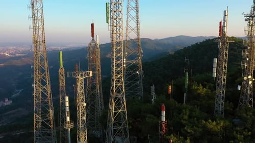 Communication Towers on Mountain at Golden Hour Sunrise