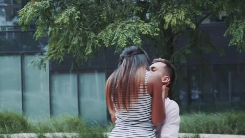 Affectionate Couple Embracing in an Urban Setting