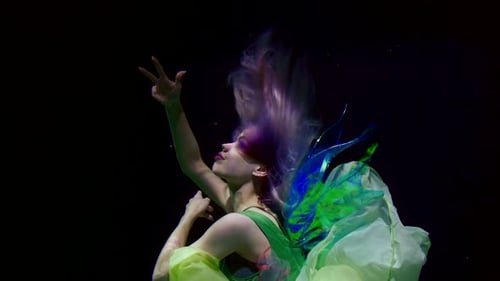 Girl in Bright Dress Is Plunging Into Dark Deepness of Ocean
