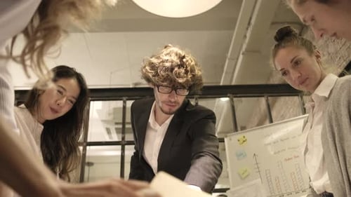 Teamwork Brainstorming Session in Modern Office Environment