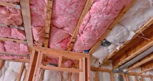 House Frame with Pink and White Insulation