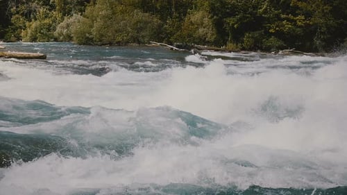 Beautiful Close-up View of Foam Splashing High Over Raging Fast River Rapids of Mighty Niagara