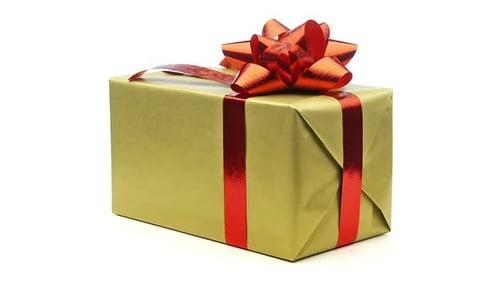 Golden Gift with a Red Ribbon Turning