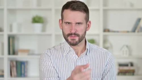 Angry Man Making Threatening Gestures