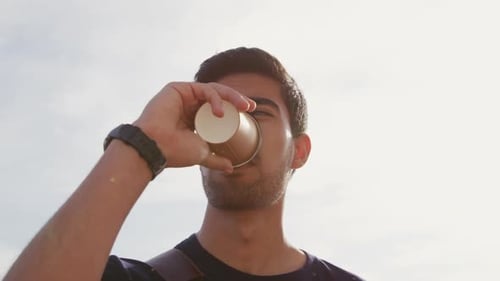Young man drinking coffee