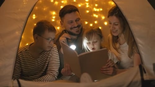 Cozy Family Reading in Tent with Fairy Lights