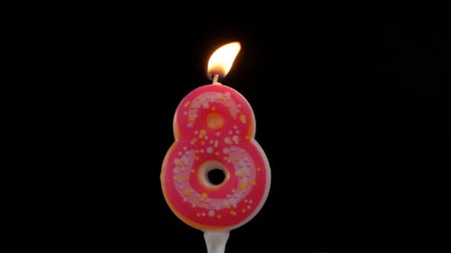 Number Eight Candle Burns Brightly