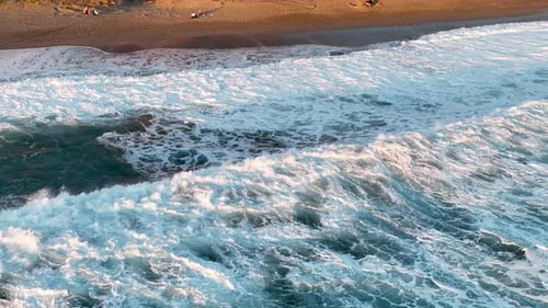 Storm at sea at sunset aerial view 4 K