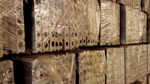 Concrete blocks at factory. Stack of precast concrete slabs in factory workshop