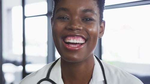 Smiling Medical Professional Close-Up in Doctor's Office