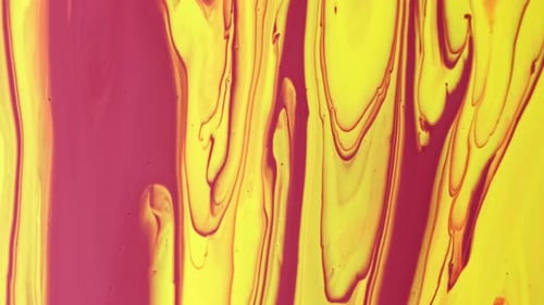 Abstract Streams of Yellow and Red Paint