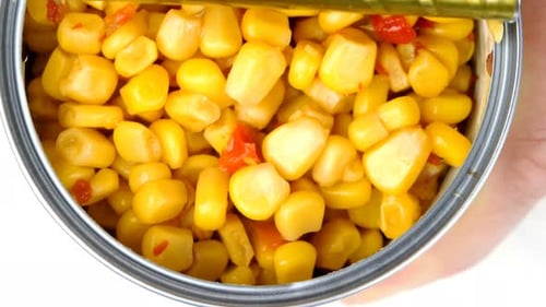 Opening a Metal Can of Sweetcorn