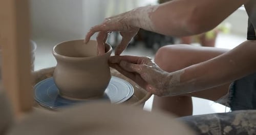 Close Up of Pottery Artist at Work Potter Master Creating Clay Pot on a Wheel