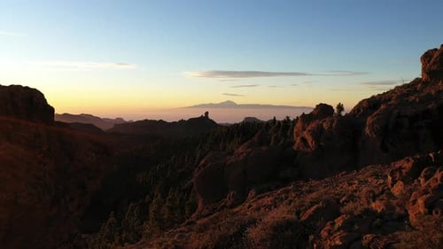 Drone Of Man In Mountain Landscape At Sunset