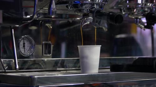 Espresso Machine Dispenses Rich Coffee into Cup