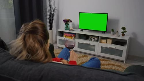 Woman Watching TV Greenscreen and Chroma Key.