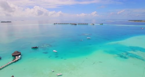 Aerial drone view of a scenic tropical island in the Maldives