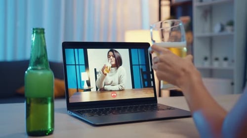 Two Friends Video Chat Over Beer