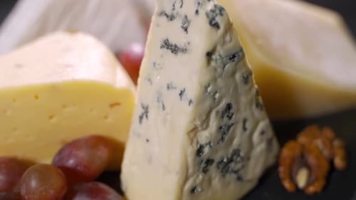 Close Up of Cheese and Grapes on Platter