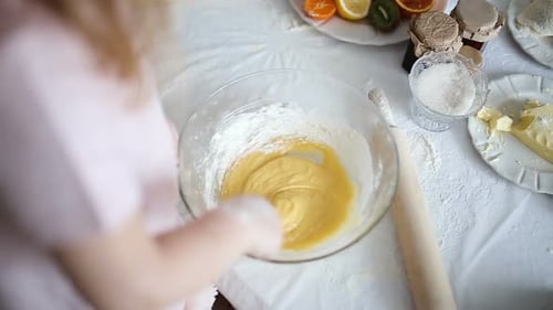 Little Girl Kneading Dough