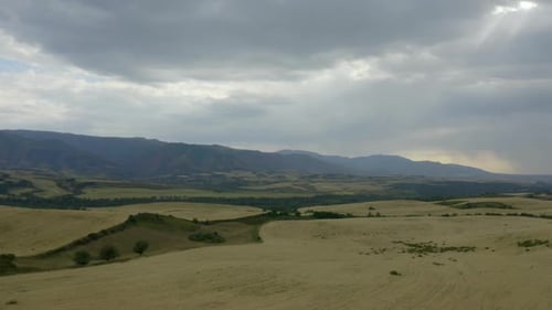 Aerial View of Rural Landscape with Golden Fields