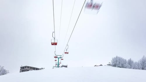 Ski Lift Skiers and Snowboarders Resort in Carpatian Mountains Time Lapse