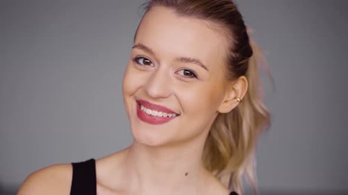 Blonde Woman Smiling Close-Up Portrait