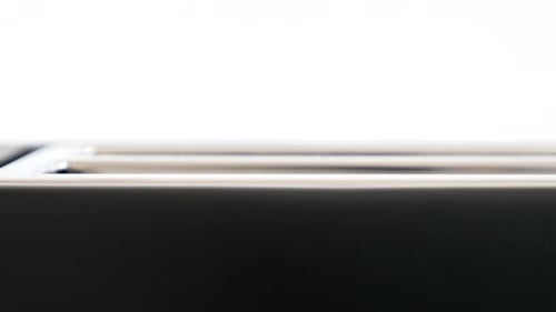 Crispy Toast Popping out of Toaster