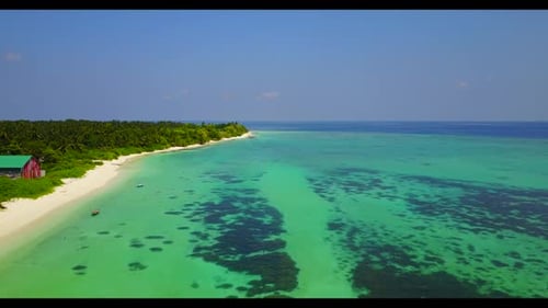 Aerial flying over texture of idyllic shore beach trip by shallow sea and white sandy background of