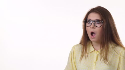 Woman Looking Surprised with a Positive Reaction